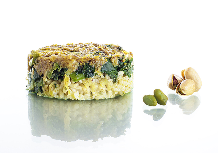 Gratinado de arroz, espinacas y pistacho americano